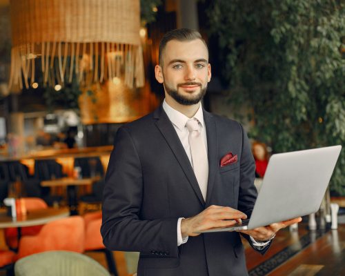 Businesspeople with a laptop. Close up keyboard.